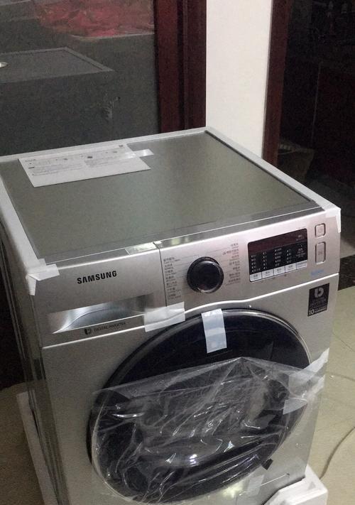 三星洗衣机故障OE怎么处理（清除排水管异物即可轻松修复洗衣机故障）