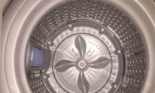如何处理洗衣机取出硬币后漏水问题（解决洗衣机取出硬币后漏水的实用方法）